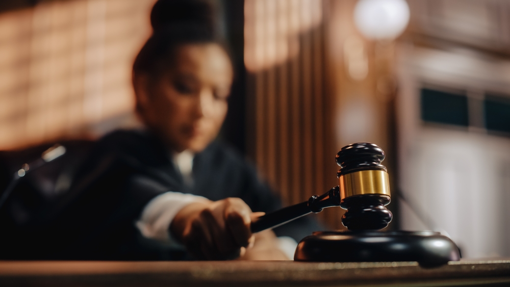 judge banging gavel in legal trial